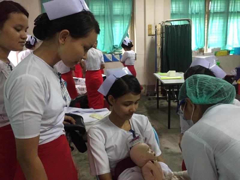 Trainee midwives practising techniques in Myanmar